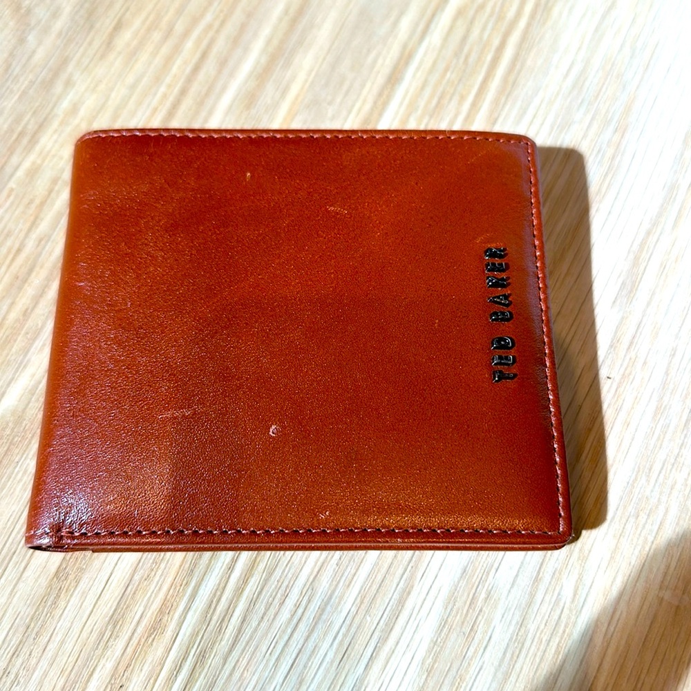 Ted Baker London tan leather bifold wallet.